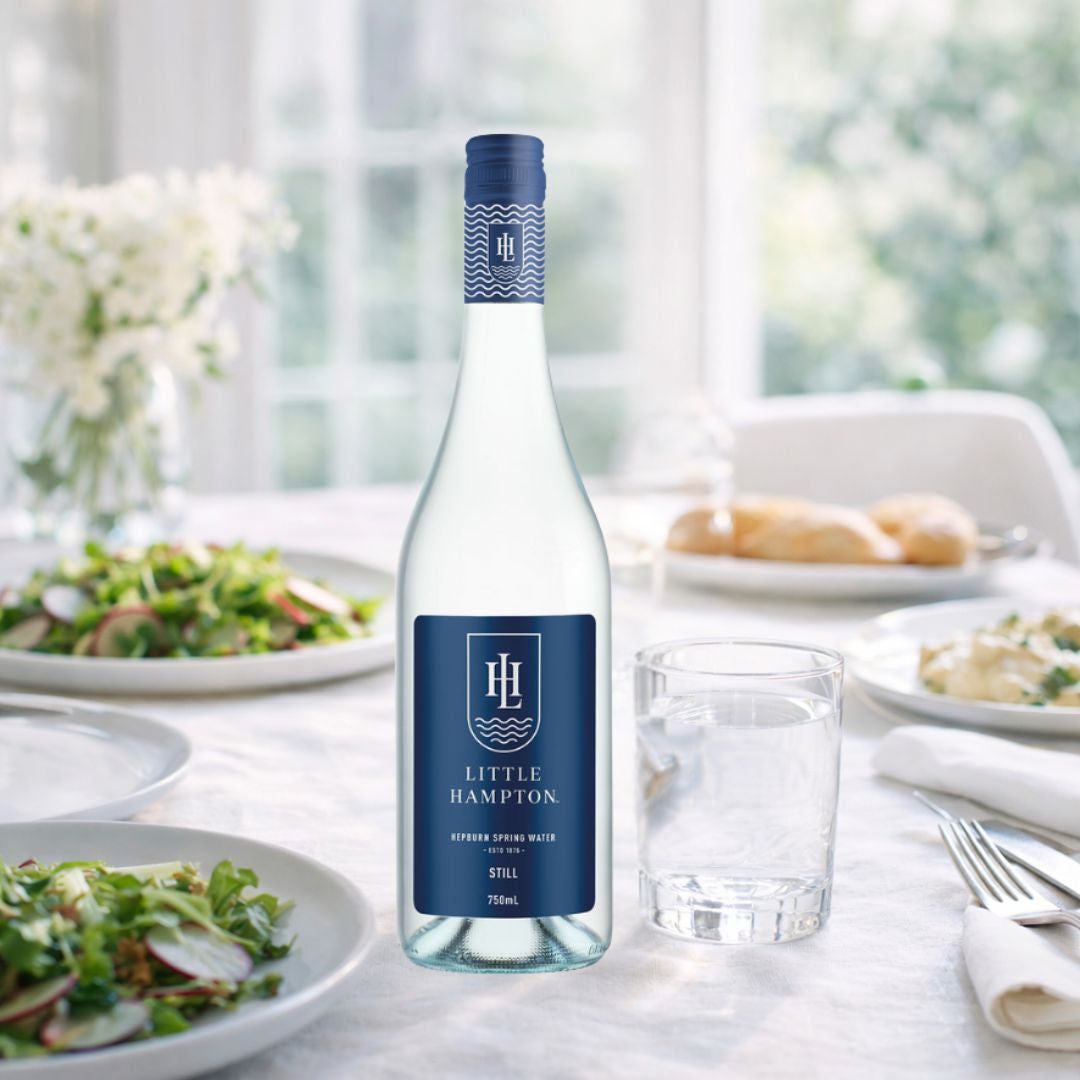 Little Hampton still spring water 750mL glass bottles served at elegant dining table