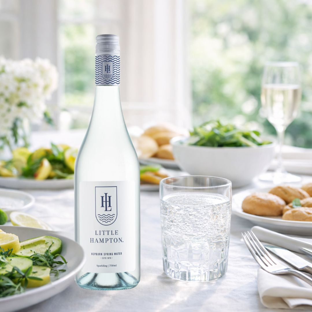 Little Hampton sparkling spring water 750mL glass bottles served at elegant dining table
