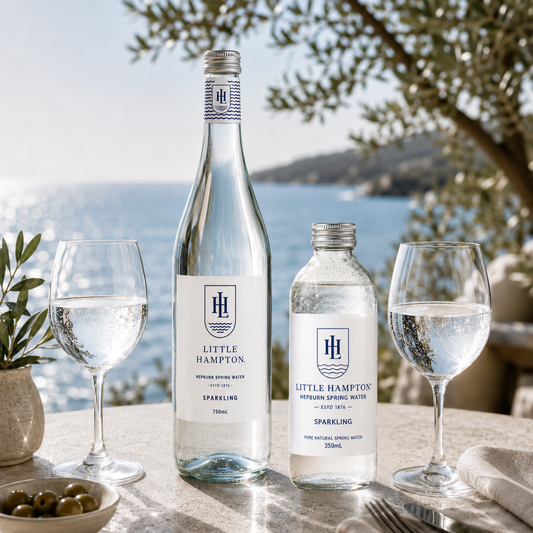 Little Hampton Spring Water premium Australian spring water in glass bottle and aluminium can representing natural purity, quality and certified food safety standards.