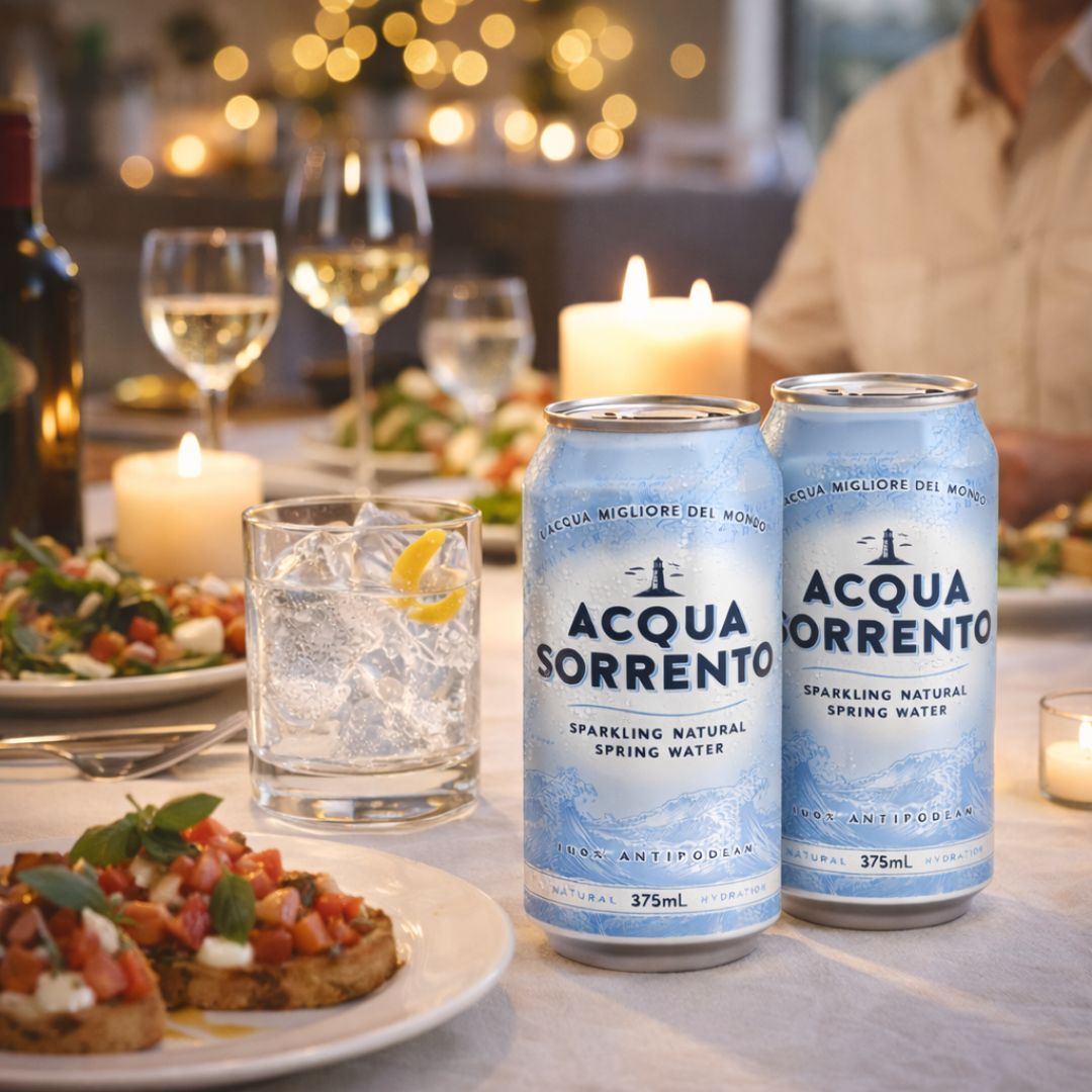 Acqua Sorrento sparkling natural spring water cans served at the table for entertaining and dining