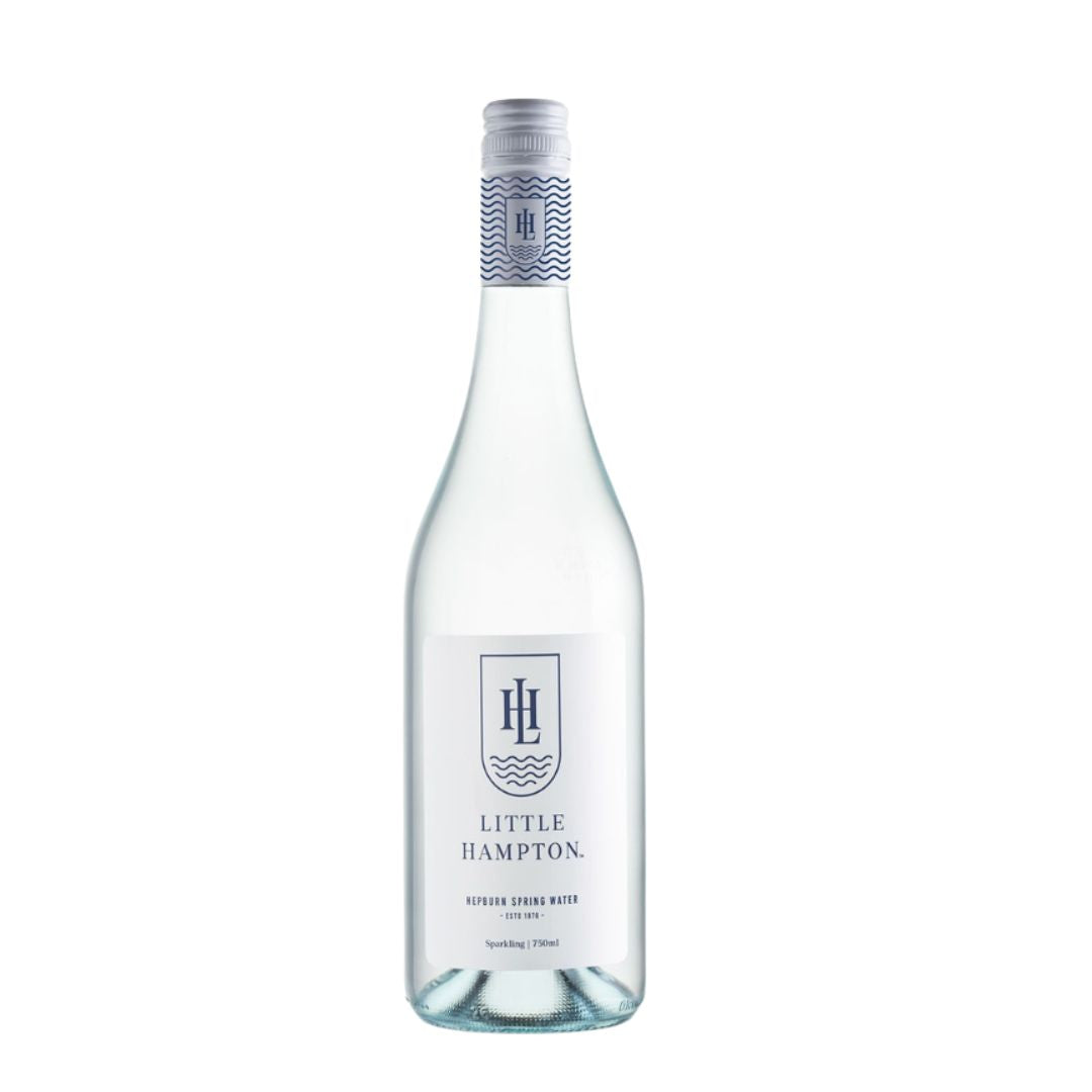 Clear bottle of Little Hampton spring  water on a white background