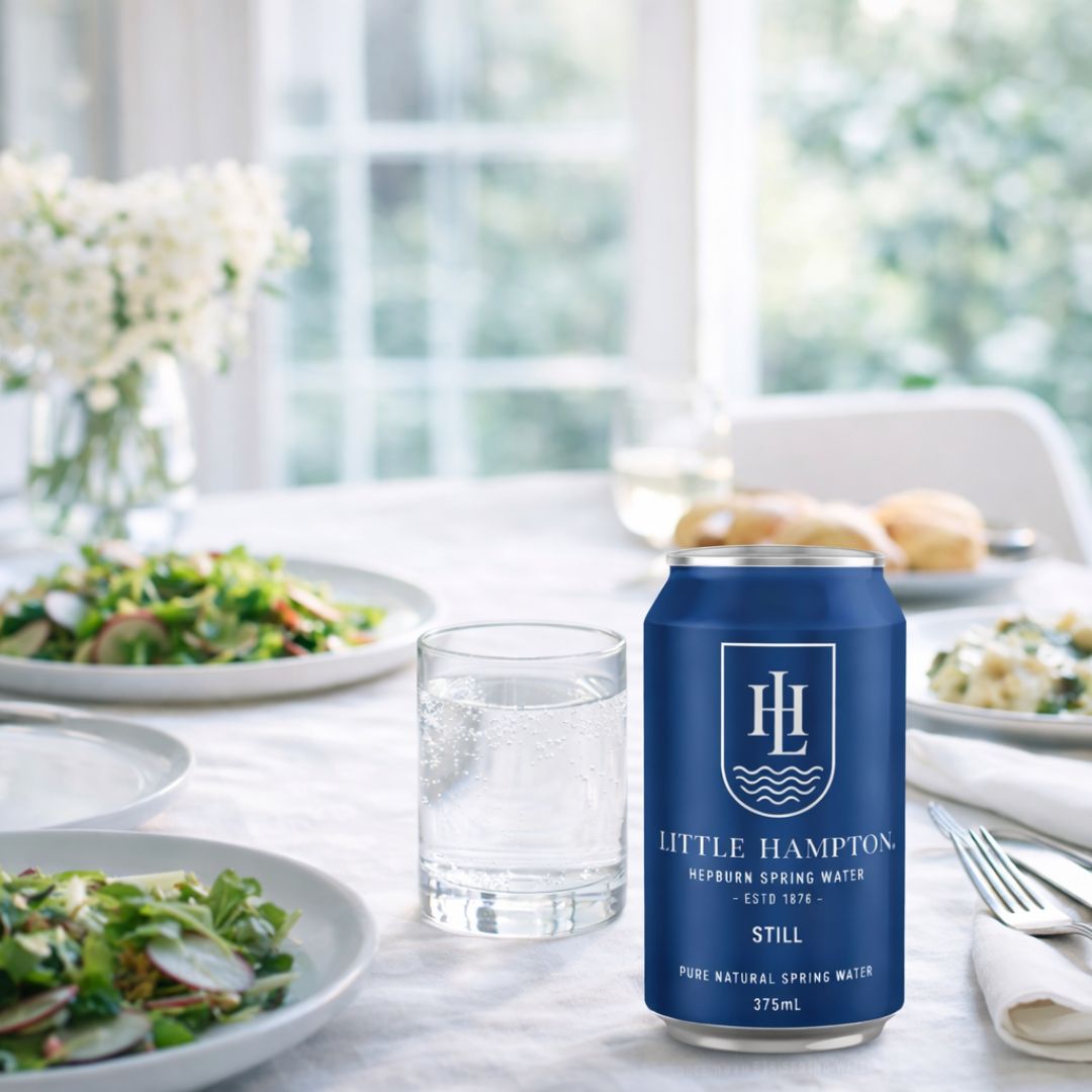 Little Hampton still spring water 375mL cans served at dinner table